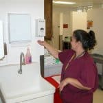 using automatic sanitizer dispenser