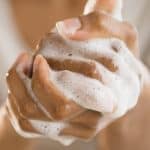 washing hands with hand soap